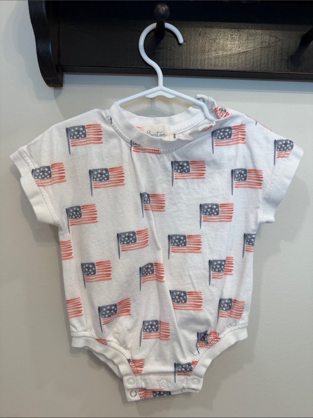 Burton White Baby One-Piece with Red & Blue Flag Print